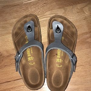 Silver flip flop style Birkenstocks size 36